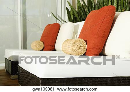 Close-up of cushions on chairs in a living room View Large Photo Image Stock Image - Close-up of cushions on chairs in a living room. Fotosearch