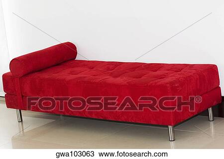 Stock Image - Couch in a room of a house. Fotosearch