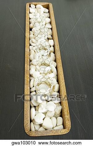 Decorative glasses on pebbles View Large Photo Image Stock Image - Decorative glasses on pebbles. Fotosearch