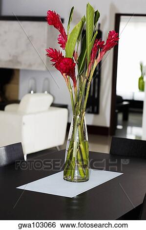 Flower vase on a table View Large Photo Image Stock Photograph - Flower vase on a table. Fotosearch
