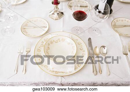 High angle view of place setting for a dinner party View Large Photo Image Stock Photo - High angle view of place setting for a dinner party. Fotosearch