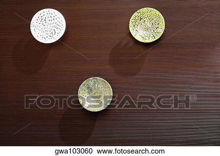 High angle view of three ceramic bowls on a table View Large Photo Image Stock Image - High angle view of three ceramic bowls on a table. Fotosearch