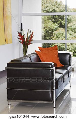 Picture - Two cushions on a couch. Fotosearch