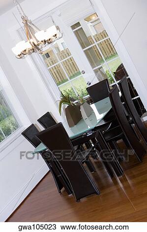 Stock Image - Interiors of a dining room. Fotosearch