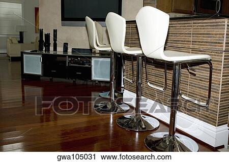 Row of chairs at a domestic kitchen View Large Photo Image Stock Image - Row of chairs at a domestic kitchen. Fotosearch