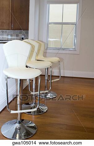 Row of chairs in a room View Large Photo Image Picture - Row of chairs in a room. Fotosearch