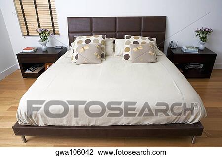 Stock Image - Interiors of a bedroom. Fotosearch