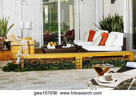 Couch and a lounge chair in a house View Large Photo Image Stock Photograph - Couch and a lounge chair in a house. Fotosearch
