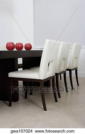 Decorative urns on a dining table in a dining room View Large Photo Image Picture - Decorative urns on a dining table in a dining room. Fotosearch