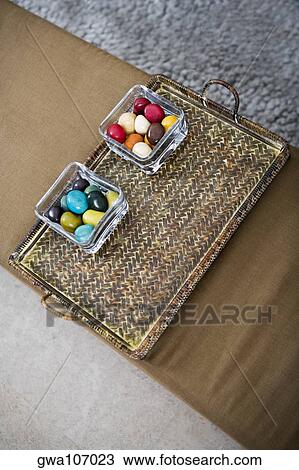 High angle view of colored stones in a serving tray View Large Photo Image Stock Image - High angle view of colored stones in a serving tray. Fotosearch
