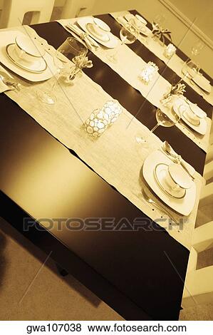 High angle view of place setting on a dining table View Large Photo Image Stock Photo - High angle view of place setting on a dining table. Fotosearch