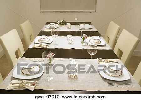 Stock Image - Place setting on a dining table. Fotosearch