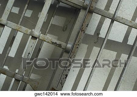 Close-up of a metal gate View Large Photo Image Picture - Close-up of a metal gate. Fotosearch