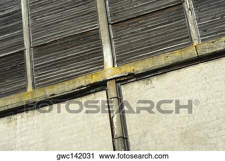 Close-up of a pipe mounted on a wall View Large Photo Image Stock Image - Close-up of a pipe mounted on a wall. Fotosearch