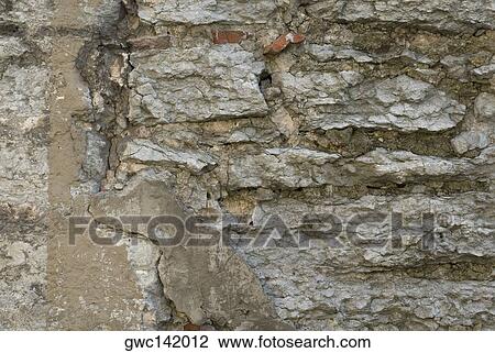 Close-up of a rugged wall View Large Photo Image Stock Image - Close-up of a rugged wall. Fotosearch