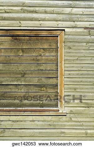 Close-up of a window on a wooden wall View Large Photo Image Stock Image - Close-up of a window on a wooden wall. Fotosearch