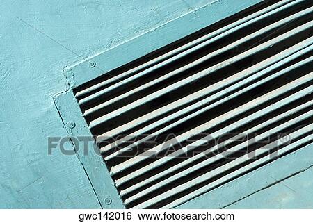 Close-up of an air duct on a wall View Large Photo Image Stock Photograph - Close-up of an air duct on a wall. Fotosearch