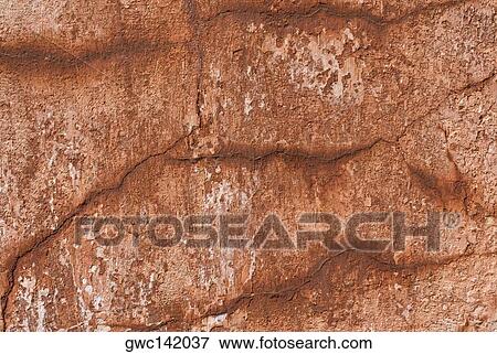 Stock Photo - Cracks on the surface of a wall. Fotosearch