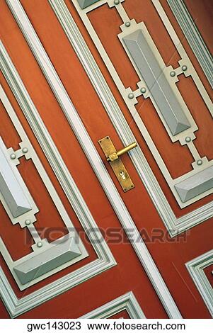 Stock Image - Close-up of a door handle. Fotosearch