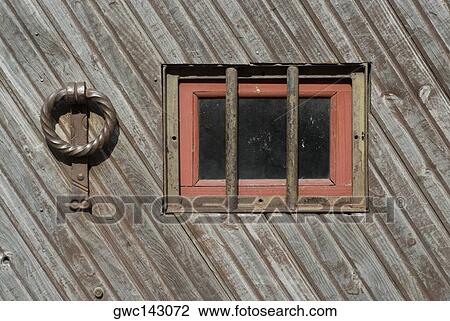 Close-up of a doorknocker with a window View Large Photo Image Stock Image - Close-up of a doorknocker with a window. Fotosearch