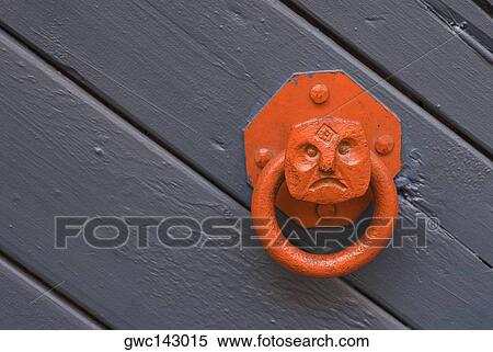 Close-up of a metal doorknocker View Large Photo Image Stock Photography - Close-up of a metal doorknocker. Fotosearch