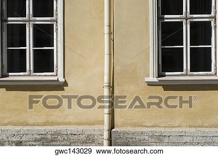 Close-up of a pipe mounted on a wall View Large Photo Image Stock Photo - Close-up of a pipe mounted on a wall. Fotosearch