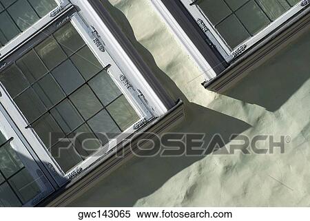 Close-up of windows on a wall View Large Photo Image Stock Photography - Close-up of windows on a wall. Fotosearch