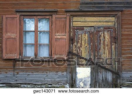Window and a closed door of a house View Large Photo Image Stock Image - Window and a closed door of a house. Fotosearch