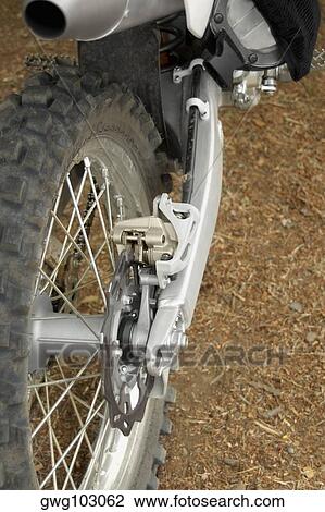 Motocross rider riding a motorcycle View Large Photo Image Stock Image - Motocross rider riding a motorcycle. Fotosearch