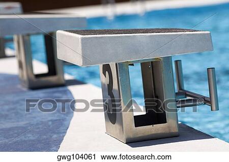 Close-up of diving platforms in a swimming pool View Large Photo Image Stock Image - Close-up of diving platforms in a swimming pool. Fotosearch