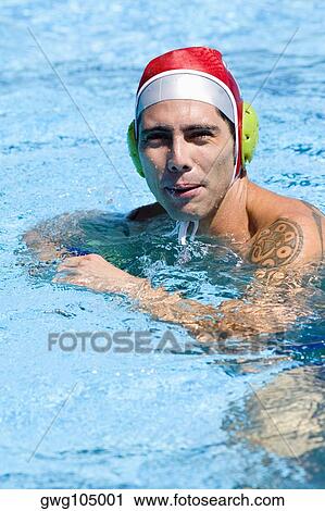 Portrait of a mid adult man in a swimming pool View Large Photo Image Stock Image - Portrait of a mid adult man in a swimming pool. Fotosearch