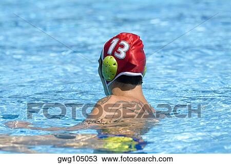 Side profile of a mid adult man swimming in a swimming pool View Large Photo Image Stock Image - Side profile of a mid adult man swimming in a swimming pool. Fotosearch