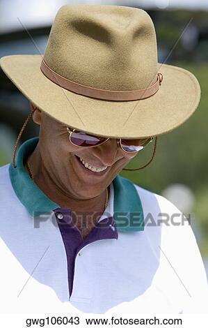 Close-up of a mature man smiling View Large Photo Image Stock Image - Close-up of a mature man smiling. Fotosearch