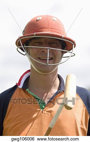 Portrait of a mature man playing polo View Large Photo Image Stock Photograph - Portrait of a mature man playing polo. Fotosearch