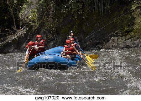 Five people rafting in a river View Large Photo Image Stock Image - Five people rafting in a river. Fotosearch