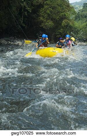 Five people rafting in a river View Large Photo Image Stock Photography - Five people rafting in a river. Fotosearch