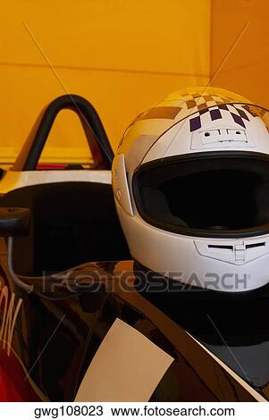 Close-up of a crash helmet on a racecar View Large Photo Image Stock Image - Close-up of a crash helmet on a racecar. Fotosearch