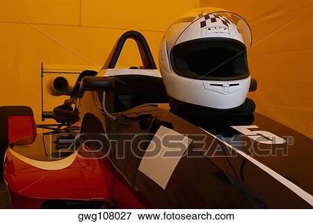 Close-up of a crash helmet on a racecar View Large Photo Image Stock Photo - Close-up of a crash helmet on a racecar. Fotosearch