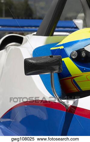 Close-up of a racecar driver in a racecar View Large Photo Image Stock Photography - Close-up of a racecar driver in a racecar. Fotosearch