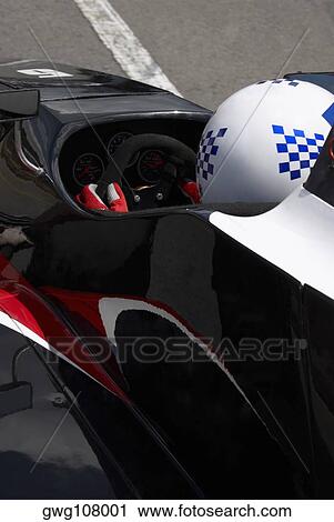 High angle view of a racecar driver in a racecar View Large Photo Image Stock Image - High angle view of a racecar driver in a racecar. Fotosearch