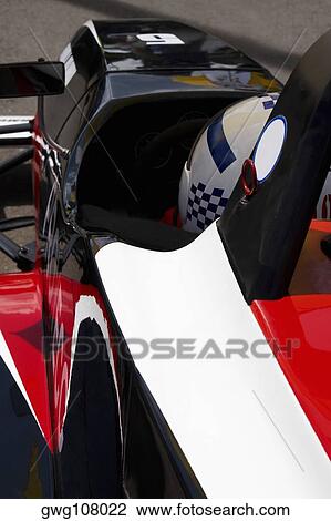 High angle view of a racecar driver in a racecar View Large Photo Image Stock Image - High angle view of a racecar driver in a racecar. Fotosearch