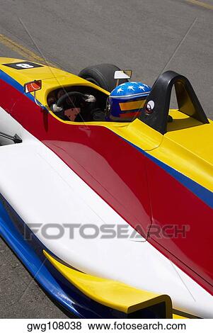 High angle view of a racecar driver in a racecar View Large Photo Image Stock Photo - High angle view of a racecar driver in a racecar. Fotosearch