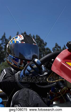 Low angle view of a person go-carting View Large Photo Image Stock Photography - Low angle view of a person go-carting. Fotosearch