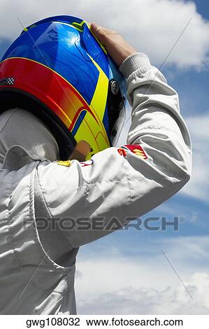 Rear view of a racecar driver View Large Photo Image Stock Image - Rear view of a racecar driver. Fotosearch
