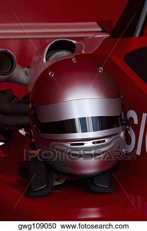 Close-up of a crash helmet on a racecar View Large Photo Image Stock Image - Close-up of a crash helmet on a racecar. Fotosearch