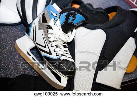 Close-up of an ice-skate with a chest protector View Large Photo Image Stock Photography - Close-up of an ice-skate with a chest protector. Fotosearch
