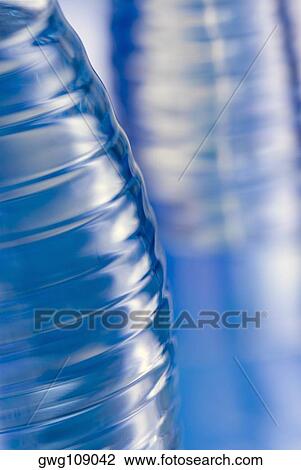 Close-up of two water bottles View Large Photo Image Stock Image - Close-up of two water bottles. Fotosearch