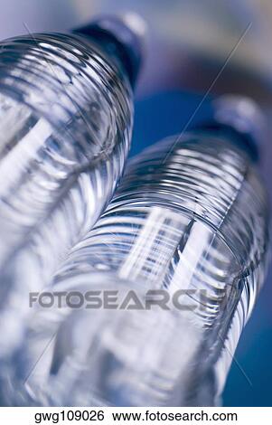 Stock Photograph - Close-up of two water bottles. Fotosearch