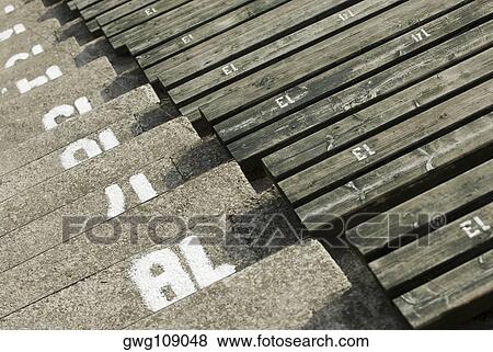 High angle view of empty bleacher seats in a stadium View Large Photo Image Stock Photo - High angle view of empty bleacher seats in a stadium. Fotosearch
