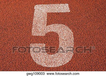 Stock Image - Track number 5 of a running track. Fotosearch